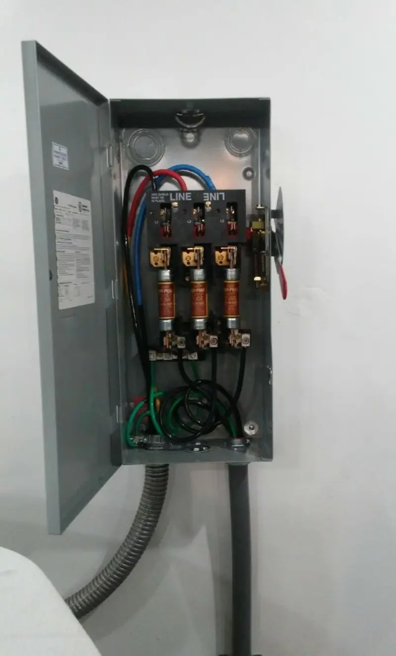 Three-phase disconnect switch installed for Smoke Detector Installation in Gentry